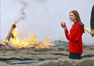 Illustration for article titled ScarJo Is Smoking In New Iron Man 2 Stills, While Doctor Who's Fires Rage On